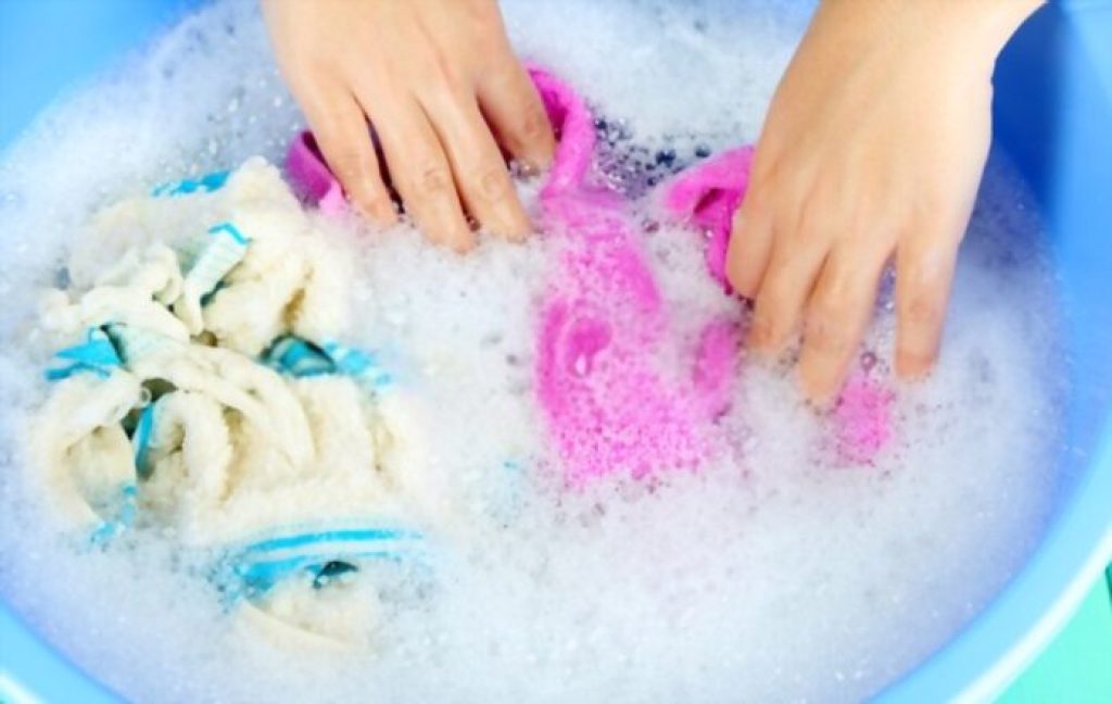 Use the Cloth Dipped in Soapy Water to Scrub the Insoles and Soles of Your Shoe